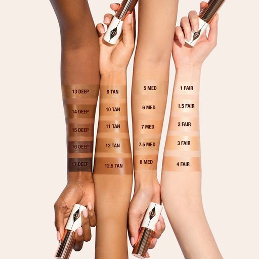 Тональна основа-стік для обличчя Charlotte Tilbury Unreal Skin Sheer Glow Tint, 8 г